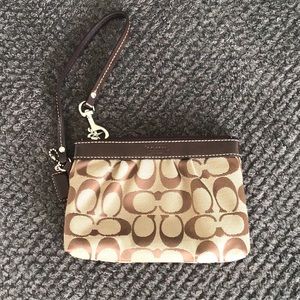 Brown coach wristlet